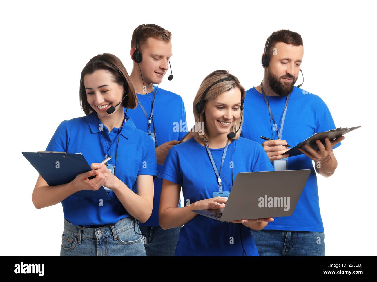 Technical support call center. Team of friendly operators working on ...