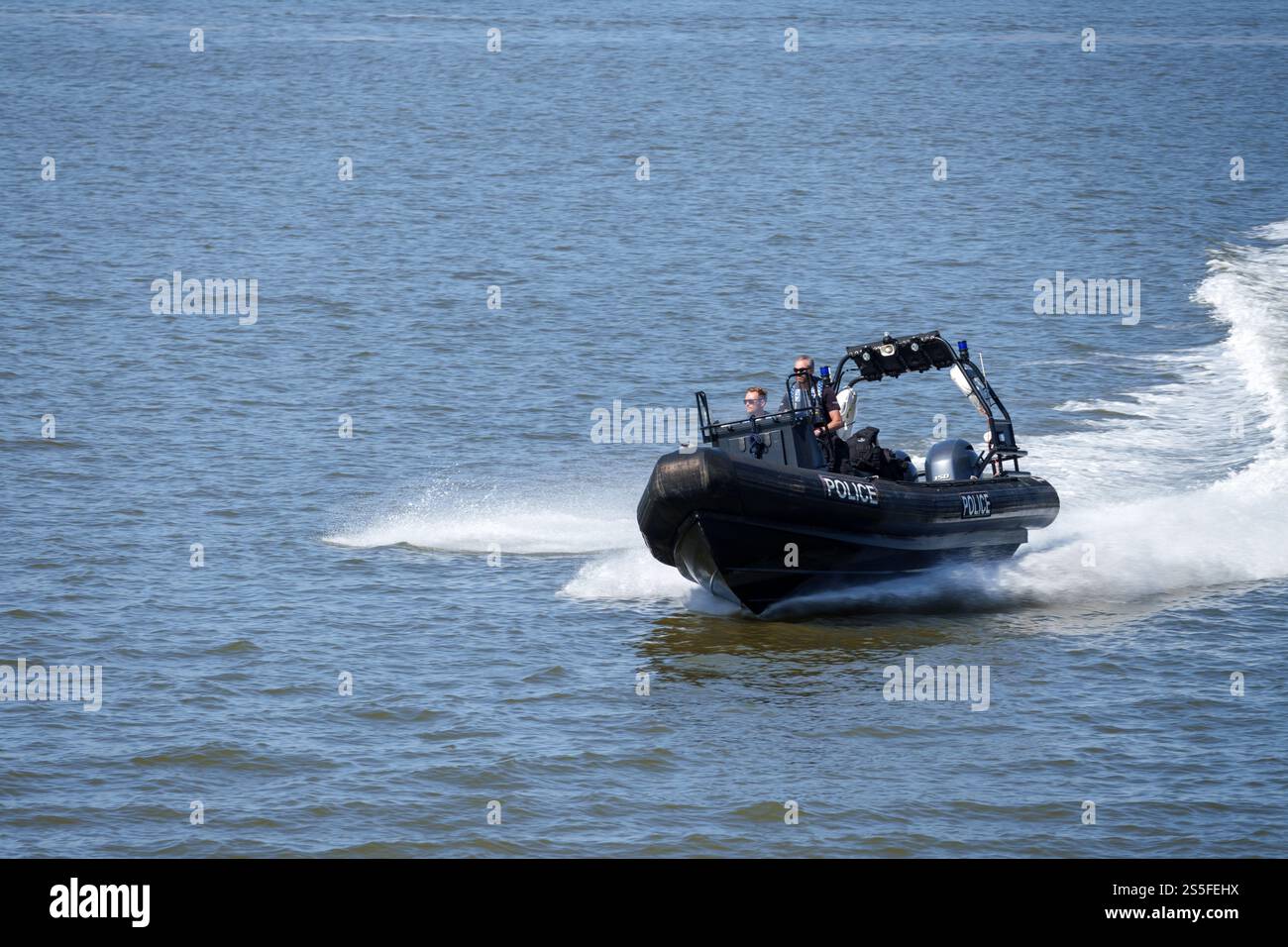 Police patrolling the River Mersey on a rigid inflatable boat Stock ...