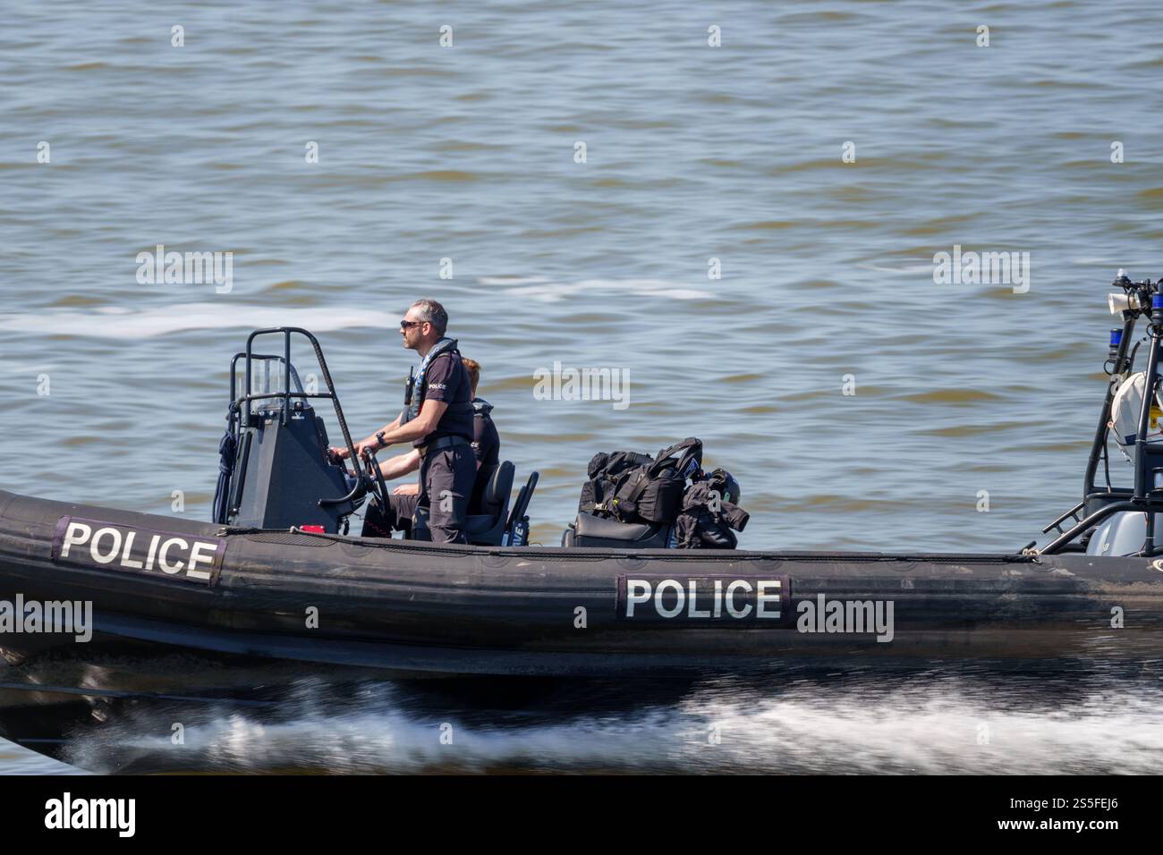 Police patrolling the River Mersey on a rigid inflatable boat Stock ...