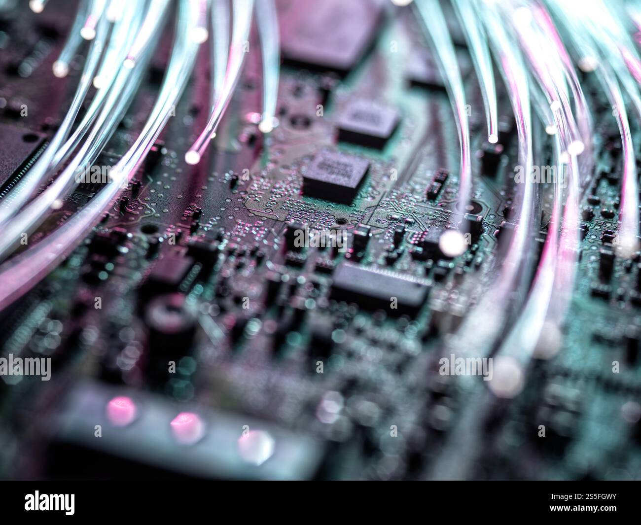 Fibre optics carrying data at speed to a computer Stock Photo