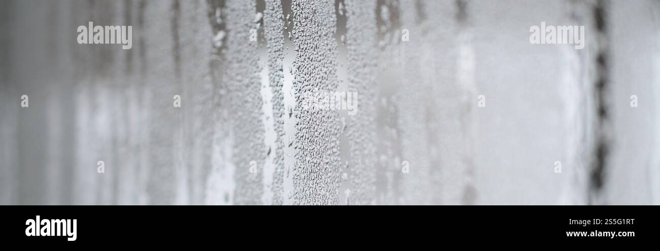 The texture of a misted glass with a lot of drops and condensation ...