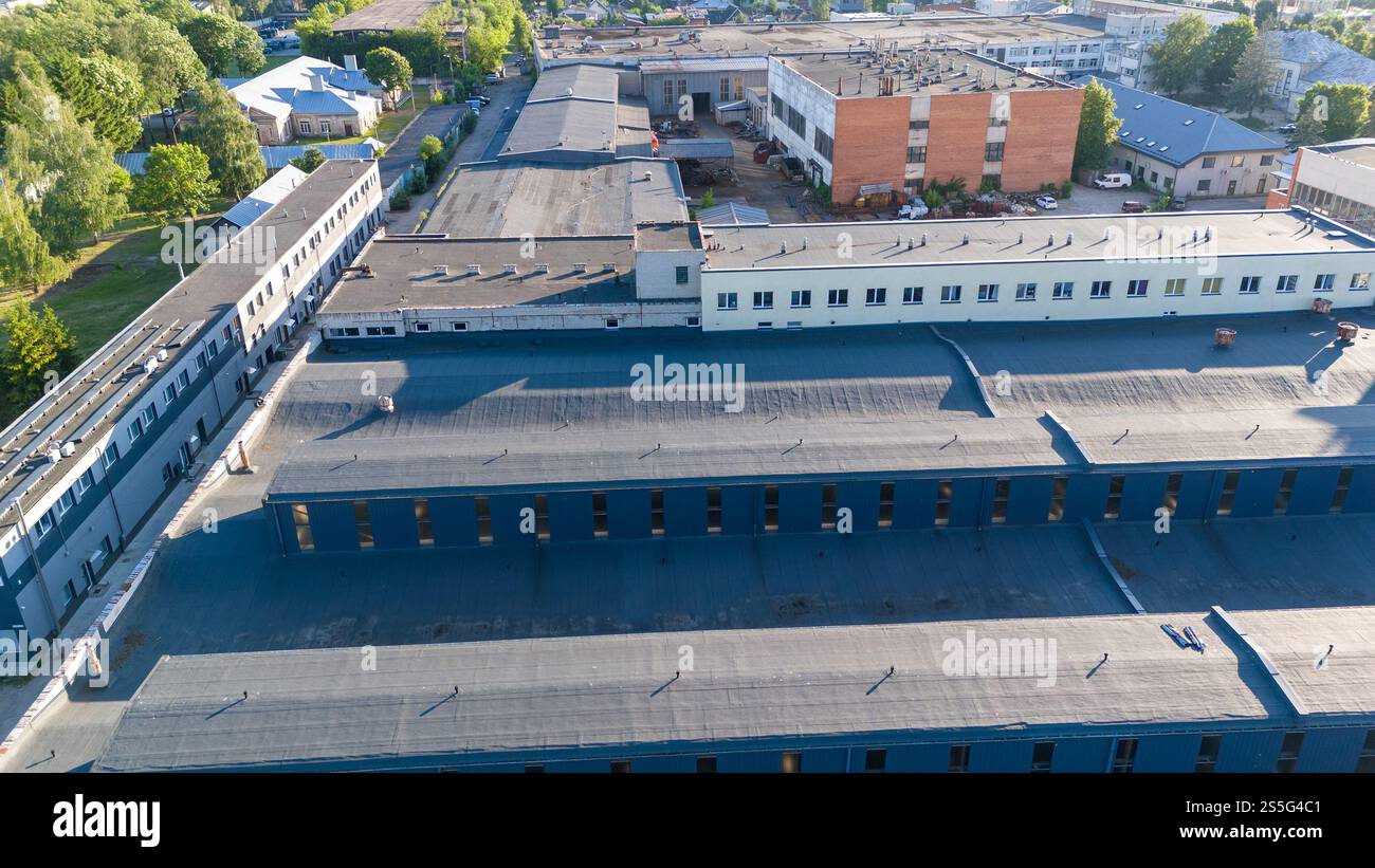 Aerial view of a large industrial complex with multiple buildings and ...