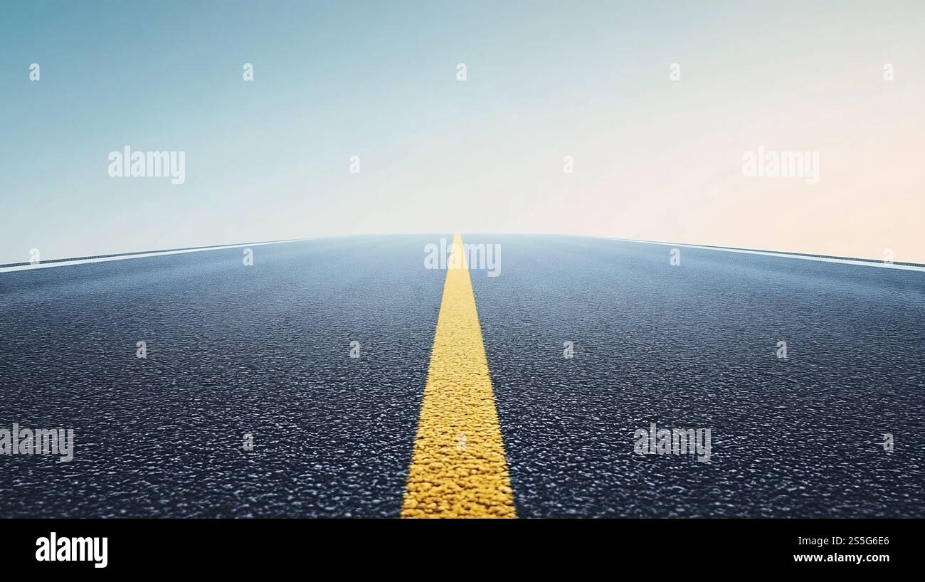 Endless highway stretching into the horizon under a clear blue sky ...
