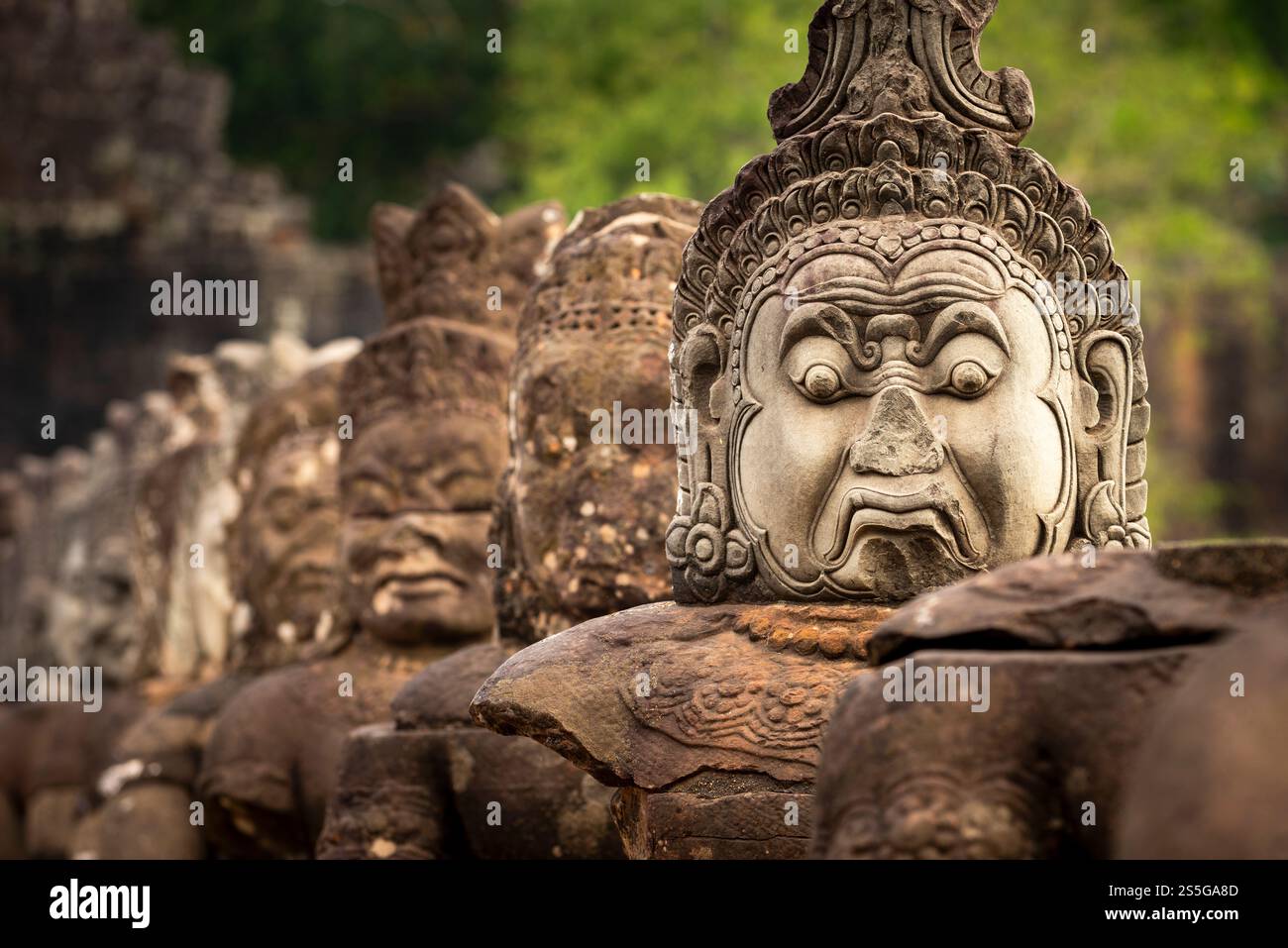 Stone statues on a bridge at Angkor, Siem Reap, Cambodia Stock Photo