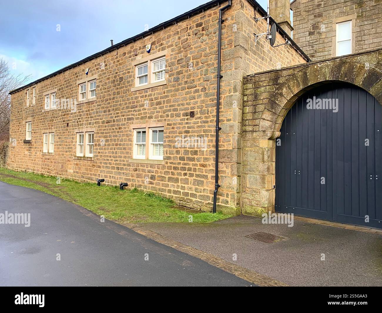 Burley in Wharfedale houses house West Yorkshire place live lived lives town Village Country England British UK stone type homes family families old - Smartphone Captured Stock Image