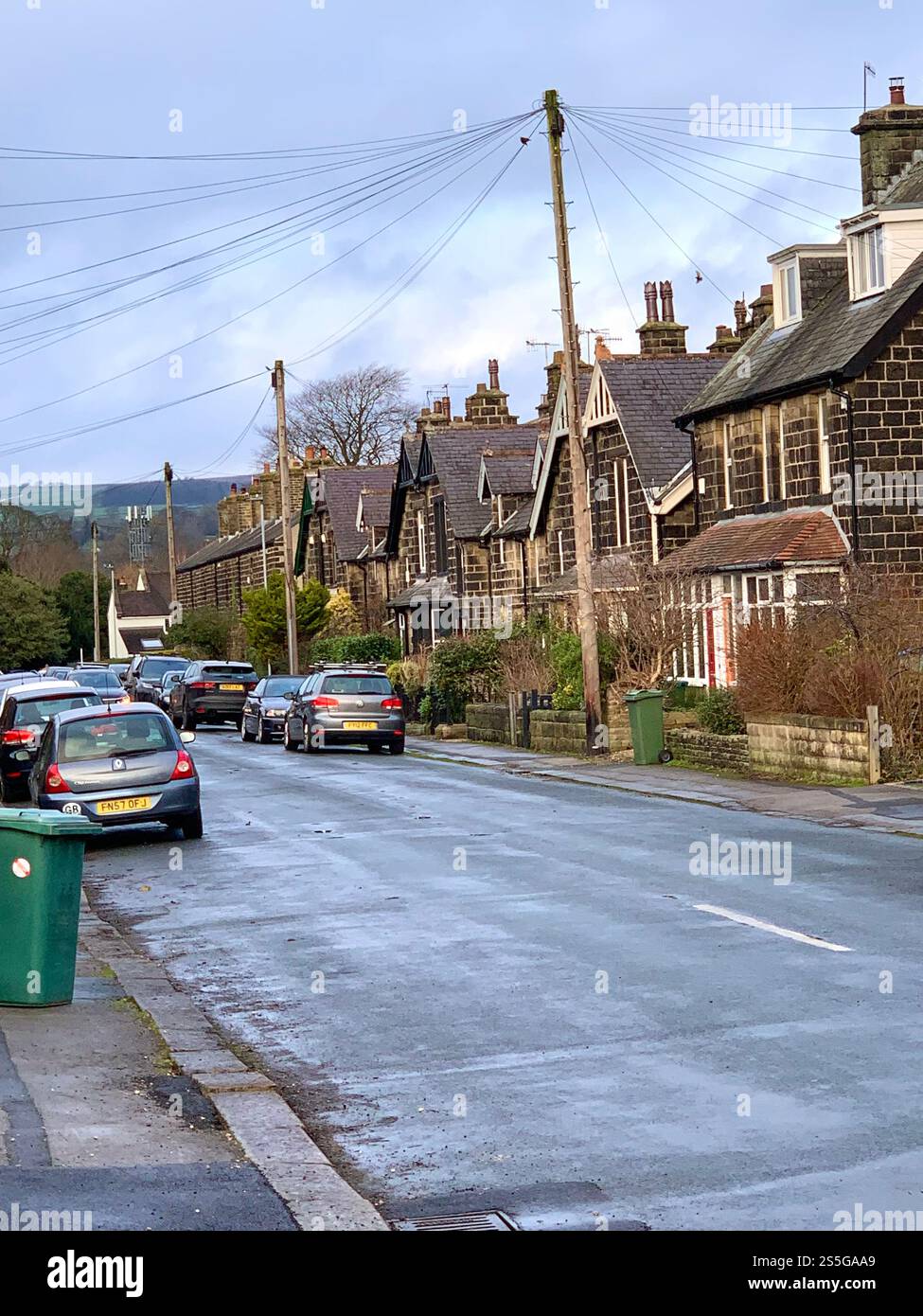 Burley in Wharfedale houses house West Yorkshire place live lived lives town Village Country England British UK stone type homes family families old - Smartphone Captured Stock Image