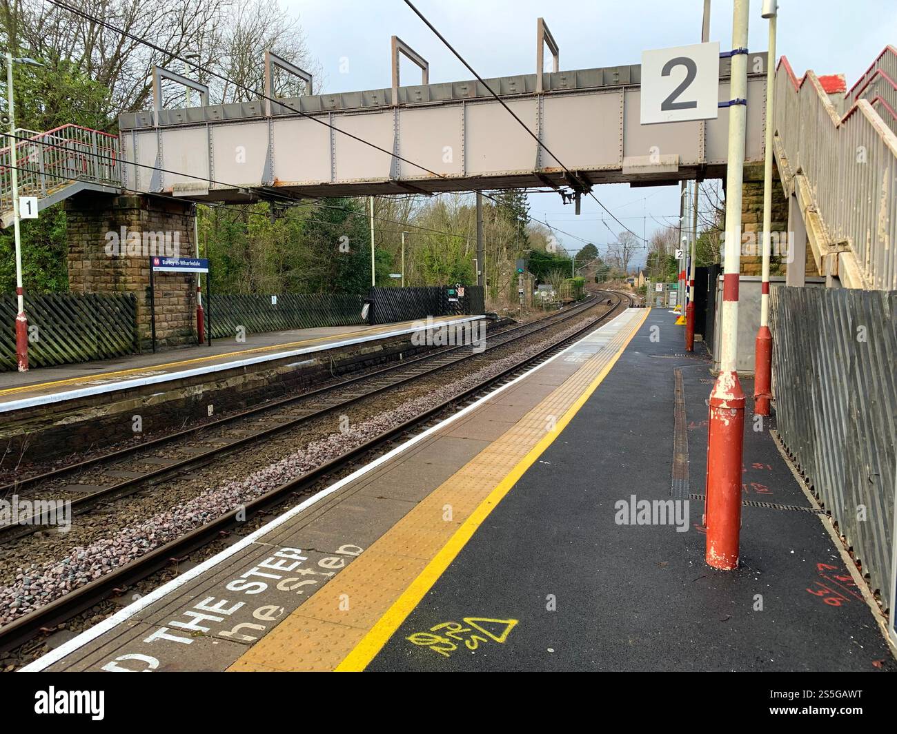 Burley in Wharfedale houses house West Yorkshire place live lived lives town Village Country England British UK stone type homes family families old - Smartphone Captured Stock Image