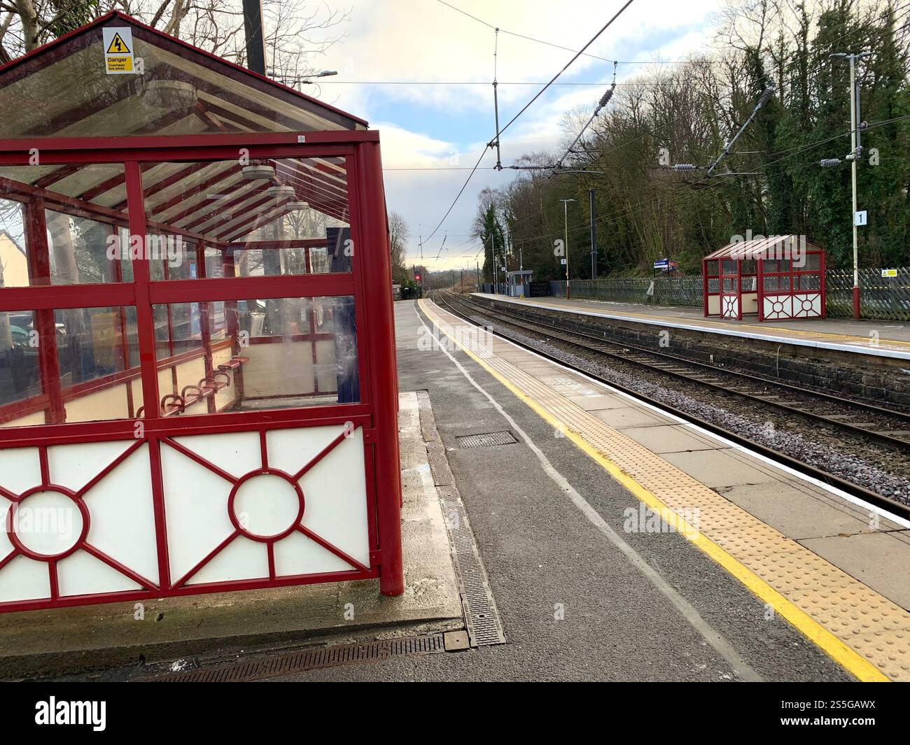 Burley in Wharfedale houses house West Yorkshire place live lived lives town Village Country England British UK stone type homes family train line - Smartphone Captured Stock Image