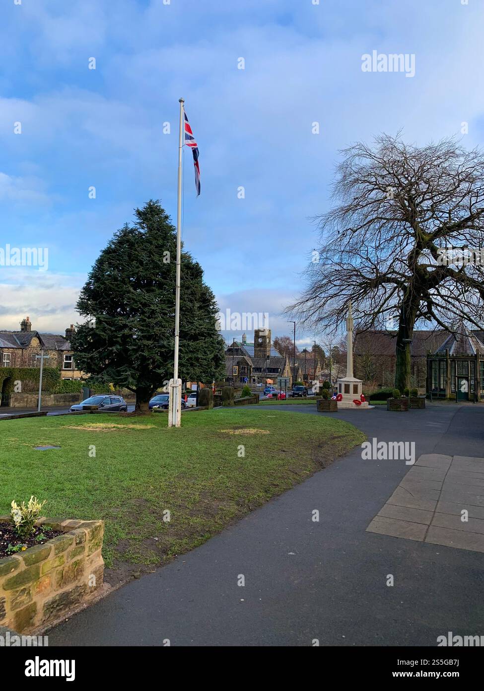 Burley in Wharfedale houses house West Yorkshire place live lived lives town Village Country England British UK stone type homes family families old - Smartphone Captured Stock Image