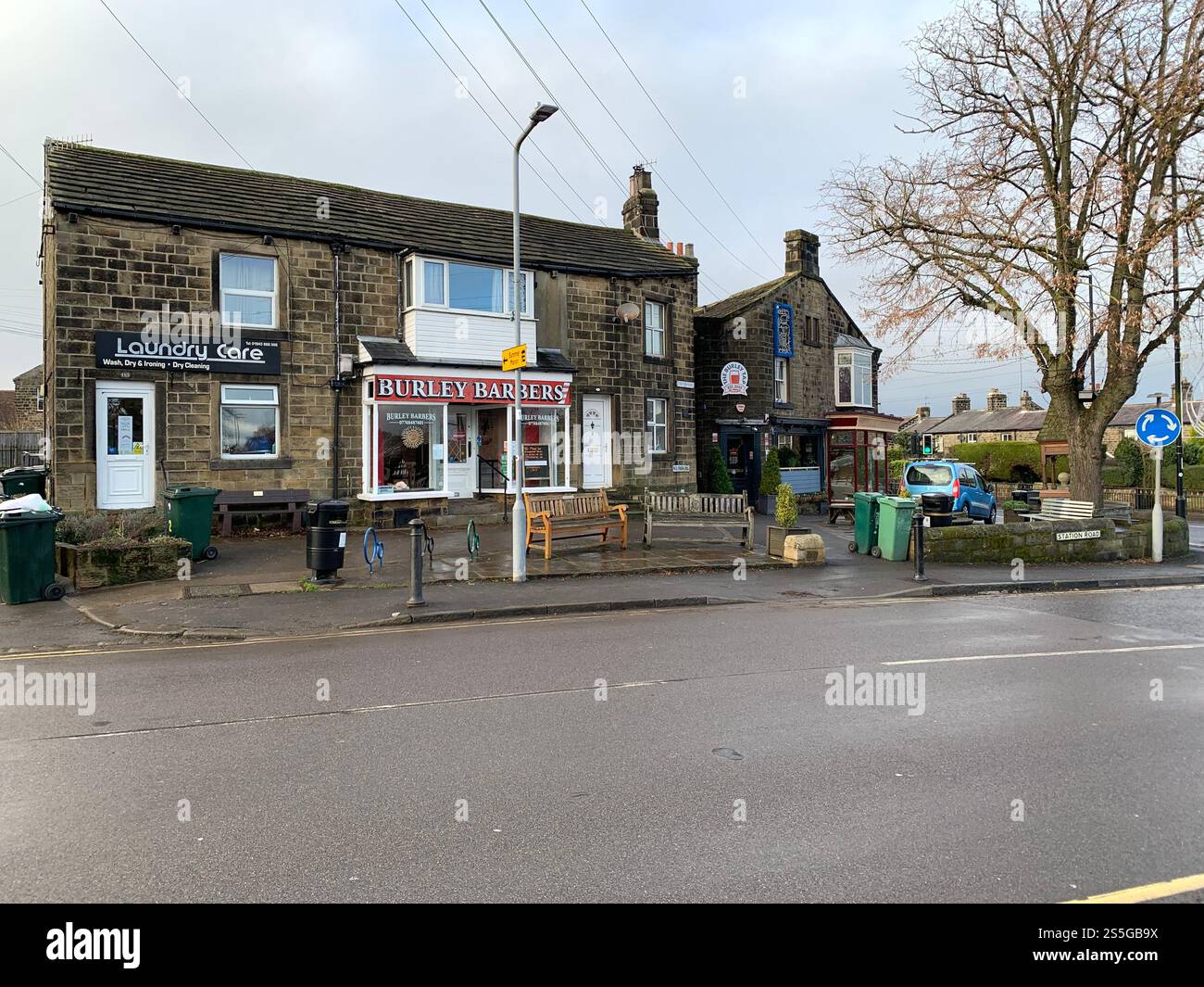 Burley in Wharfedale houses house West Yorkshire place live lived lives town Village Country England British UK stone type homes family families old - Smartphone Captured Stock Image