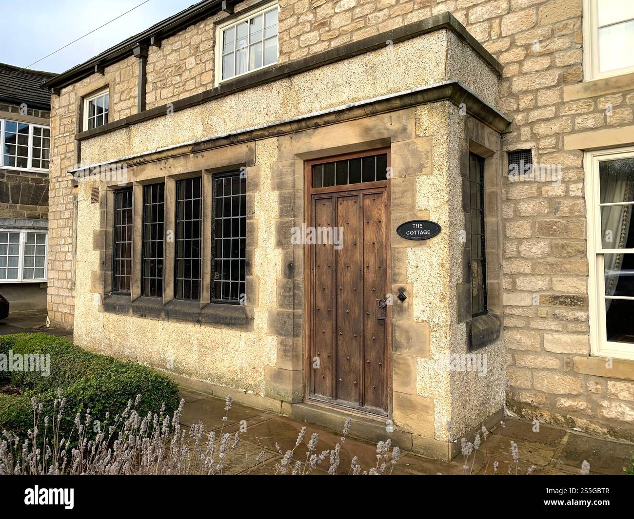 Burley in Wharfedale houses house West Yorkshire place live lived lives town Village Country England British UK stone type homes family families old - Smartphone Captured Stock Image