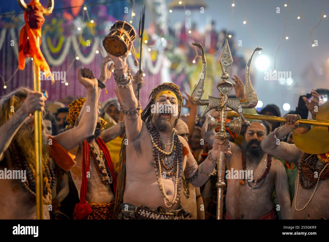 Hindu holy men or a Naga Sadhus of Niranjani Akhara attend a ritual dip ...