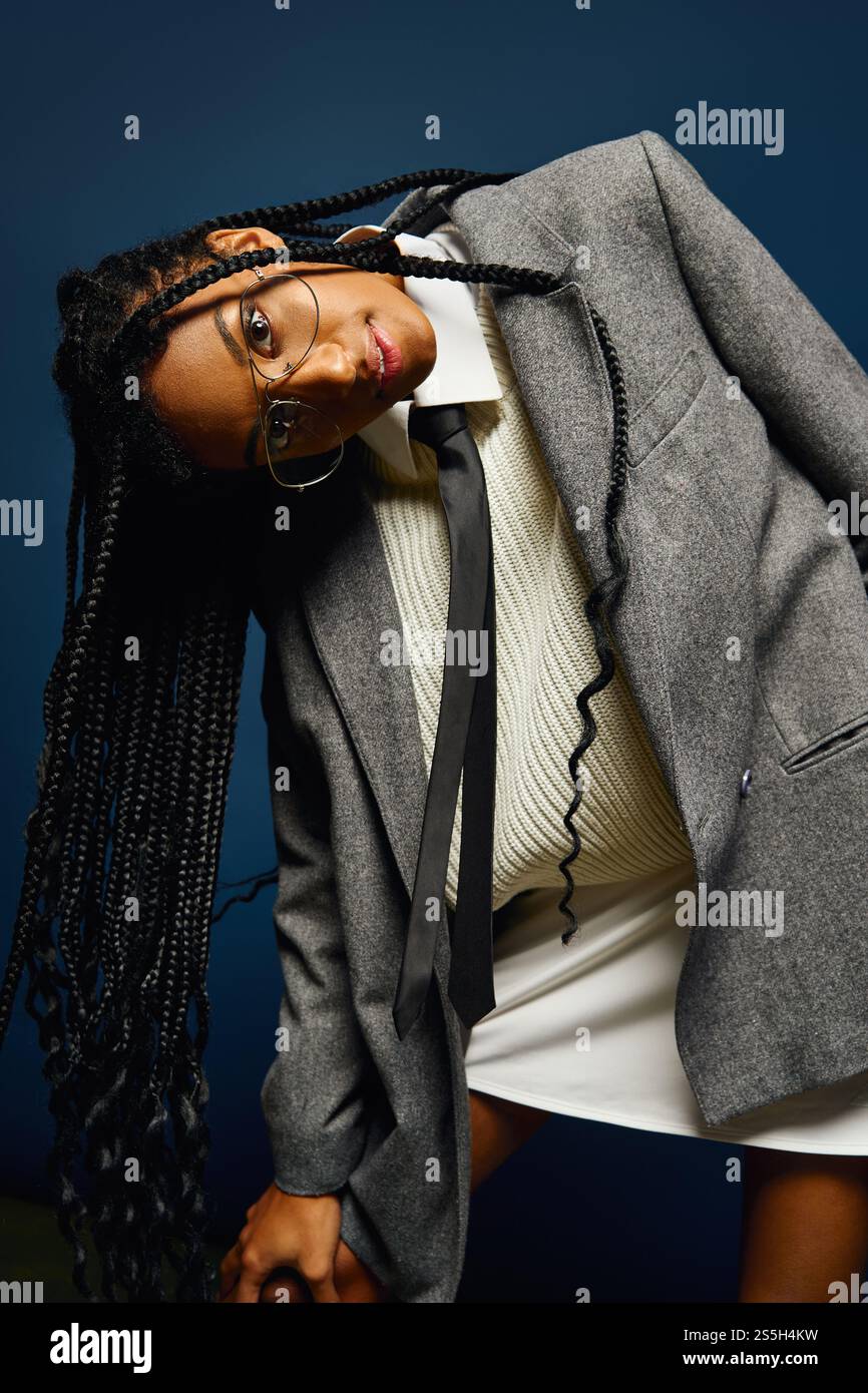 Woman wearing glasses braids hi-res stock photography and images - Alamy