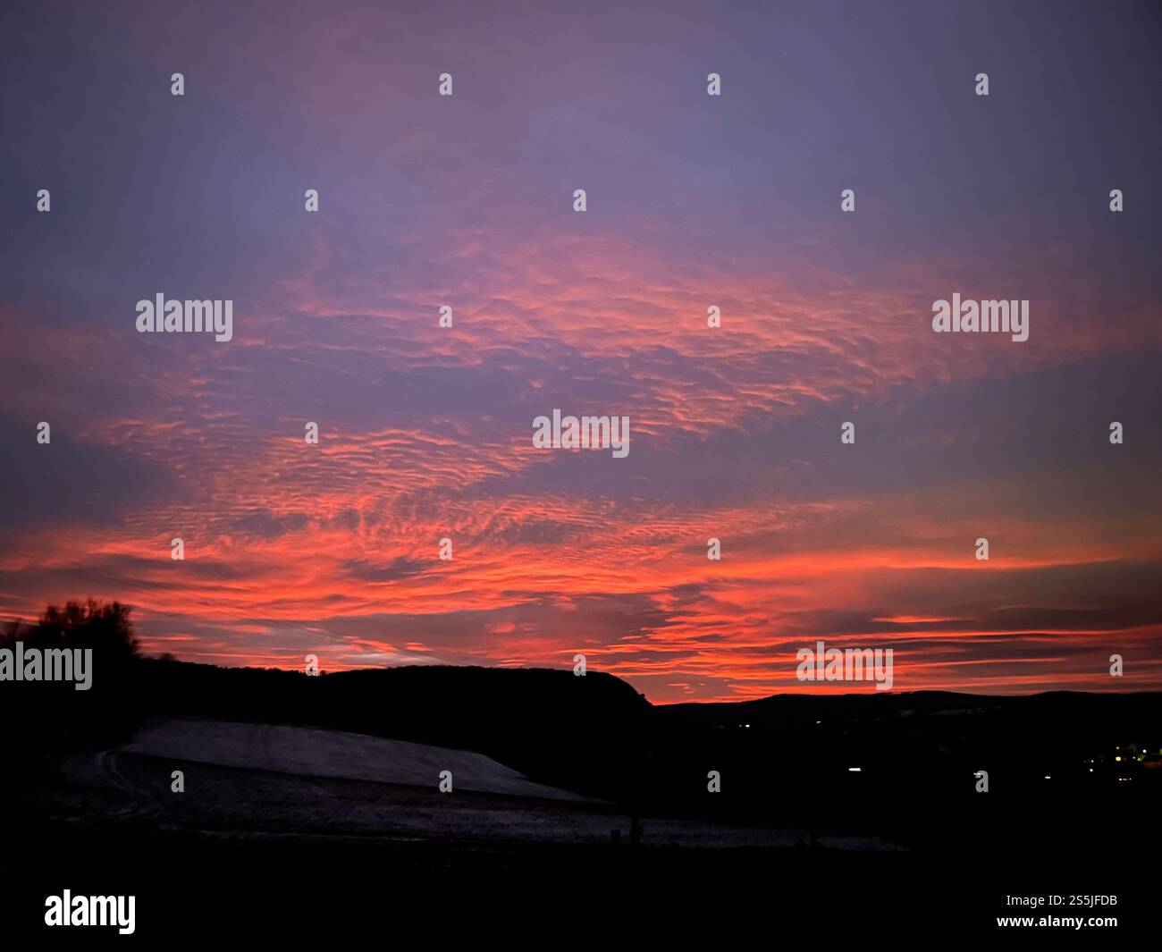 After sunset, sunset in the sky, horizon in winter over Thuringia, Germany - Smartphone Captured Stock Image