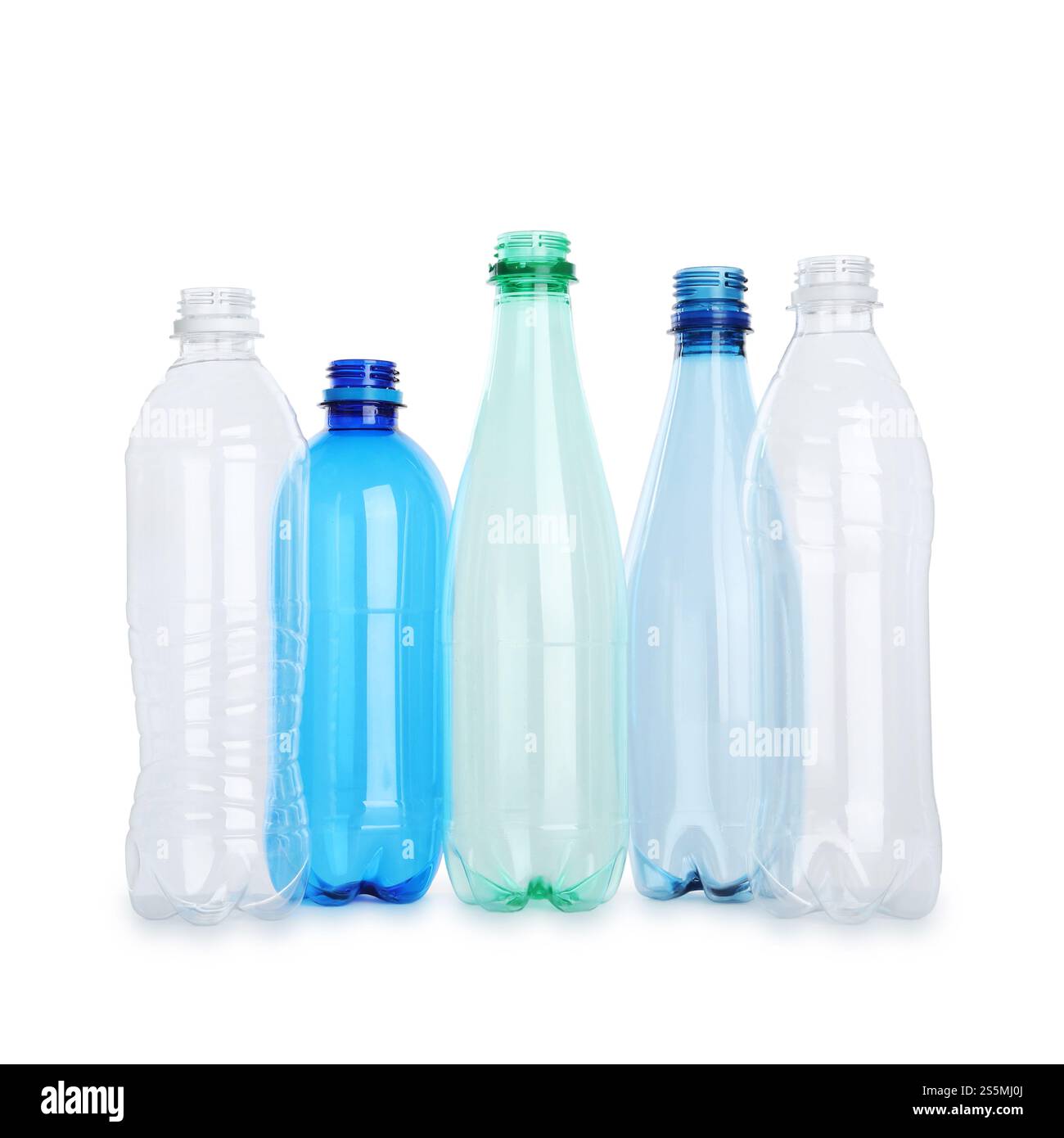 Many empty plastic bottles isolated on white Stock Photo - Alamy