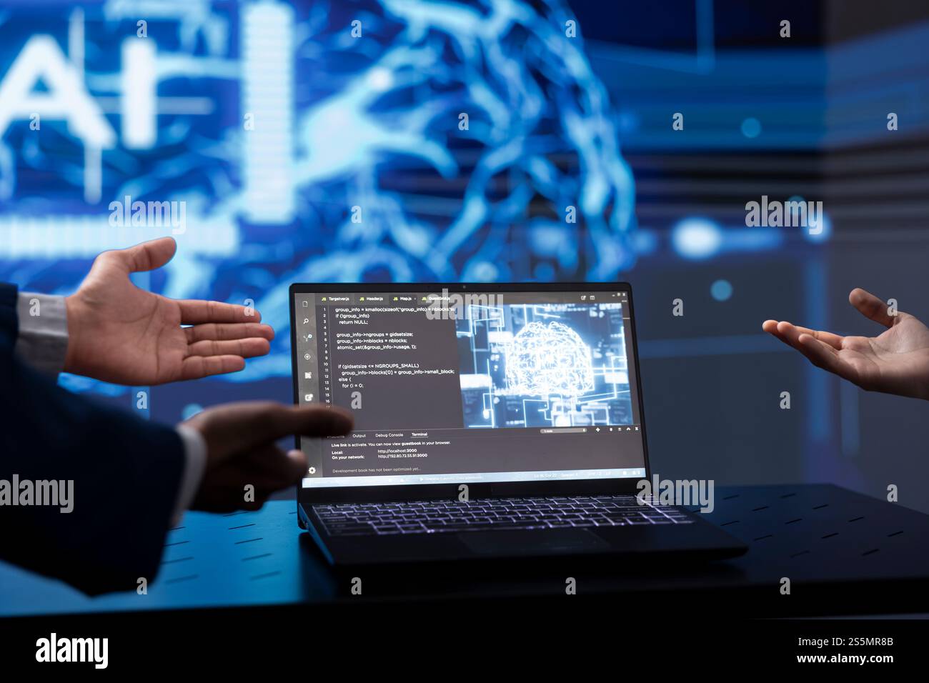 Computer scientists use AI cognitive computing to extract information from complex data on laptop. Close up of IT specialists using artificial intelligence technology on notebook Stock Photo