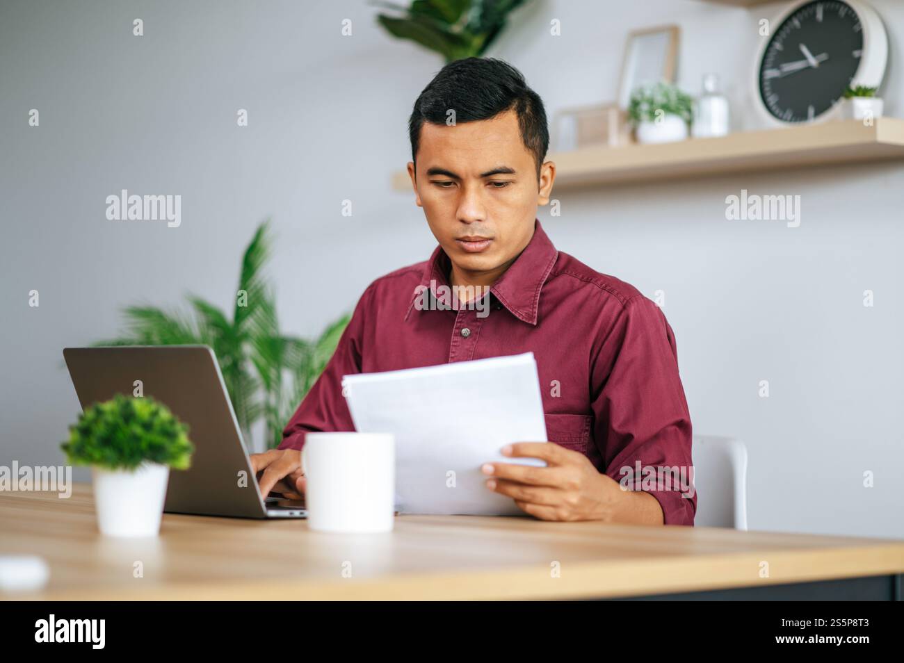 Bearded happy man works hi-res stock photography and images - Alamy