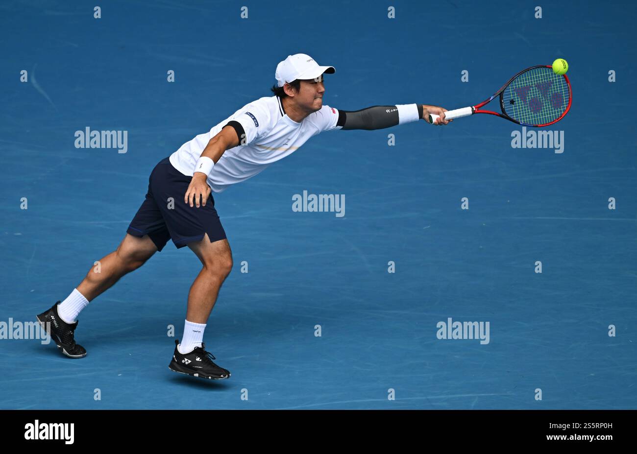 Yoshihito Nishioka of Japan returns during his round 2 match against