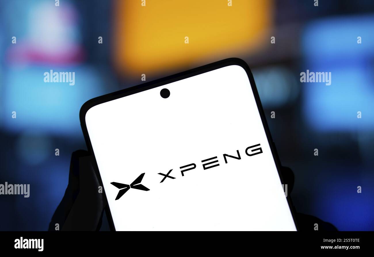 Xpeng logo is displayed on smartphone. Guangzhou Xiaopeng Motors Technology Co Ltd is a Chinese electric vehicle manufacturer company Stock Photo
