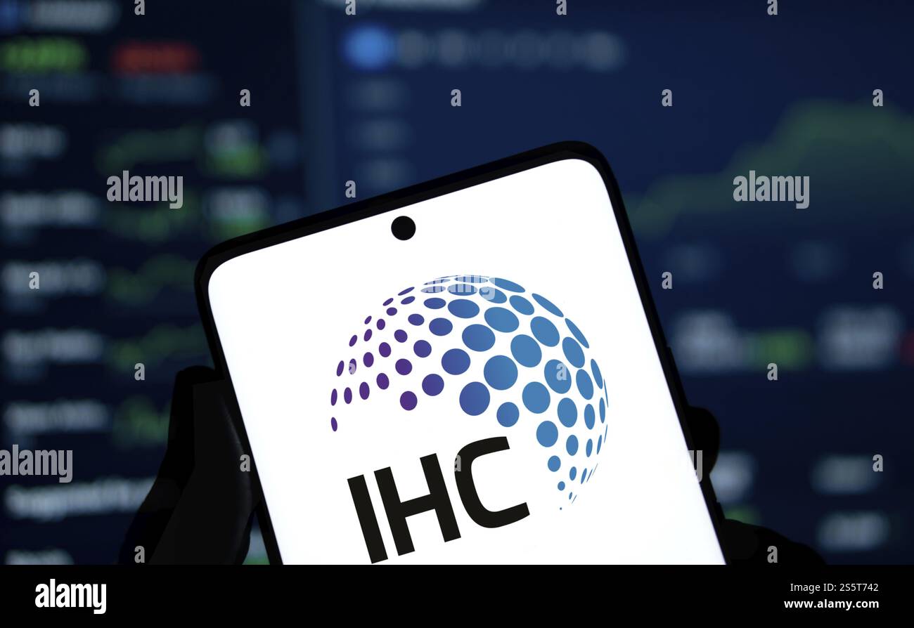 IHC logo is displayed on smartphone. International Holding Company (IHC