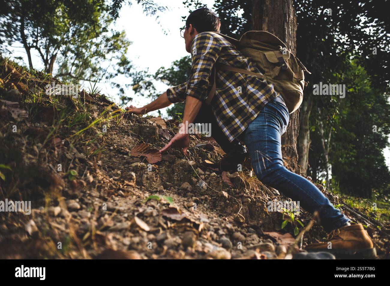 Adventure man hiking with backpack, Travel Lifestyle success concept Stock Photo