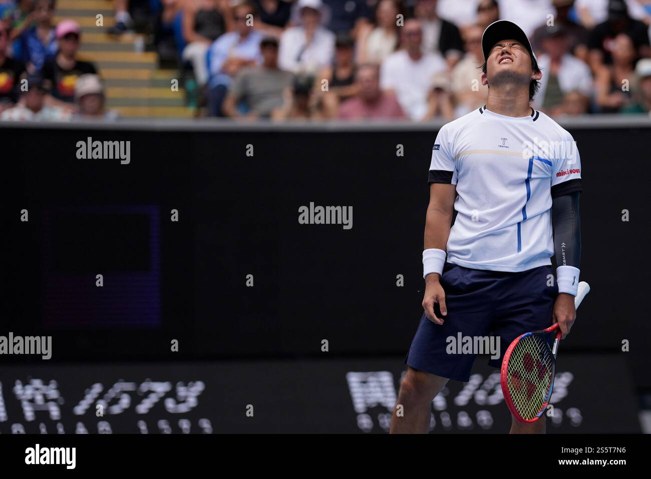 Yoshihito Nishioka of Japan reacts during his second round match