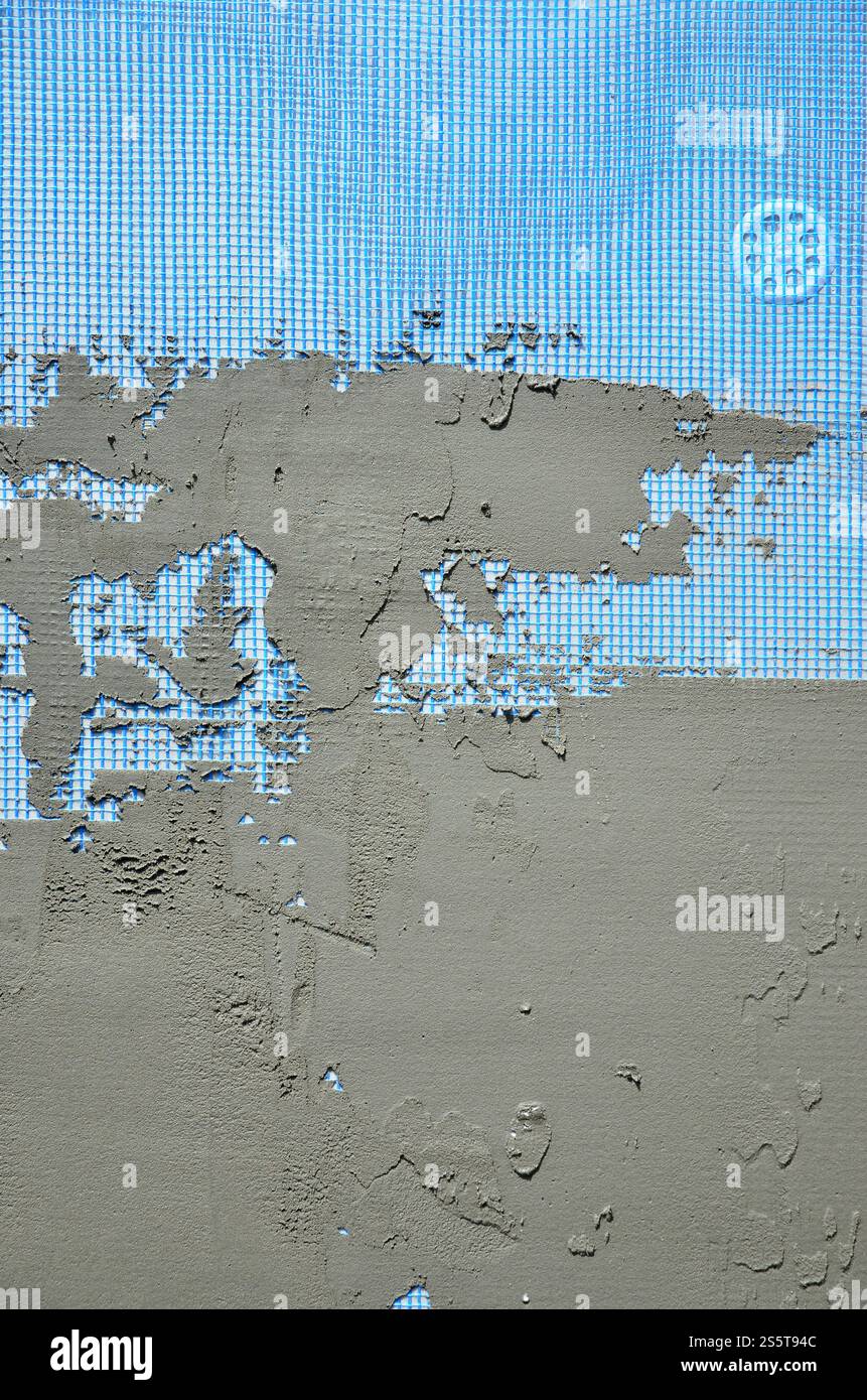 The texture of the wall, covered with gray foam polystyrene plates ...