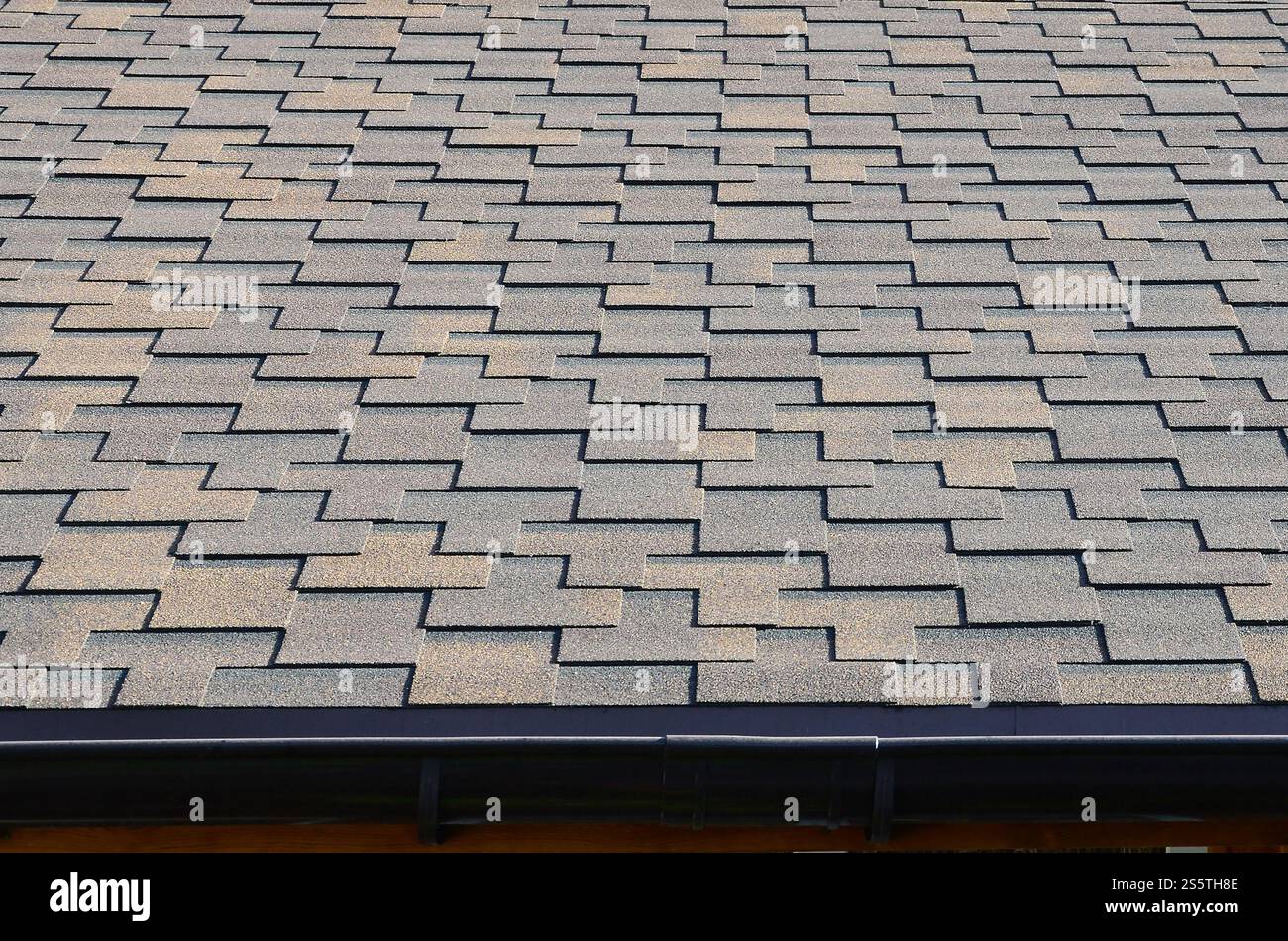 Modern roofing and decoration of chimneys. Flexible bitumen or slate ...