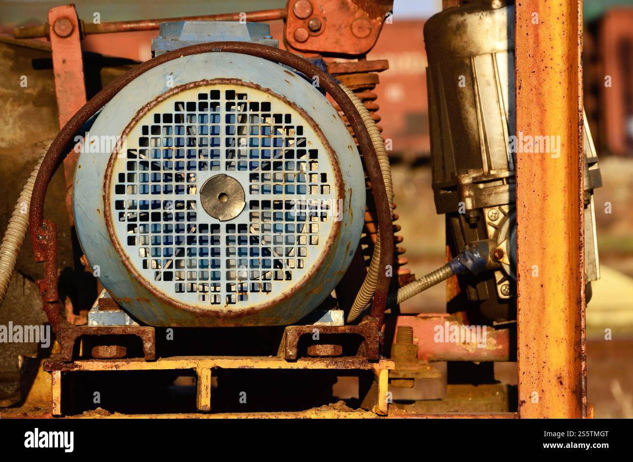 Old and rusty ventilation mechanism from the railway crane. Ventilation mechanism from the crane Stock Photo