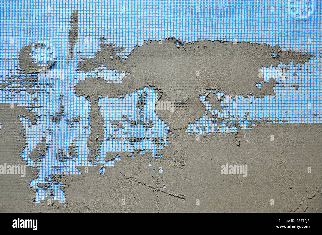 The texture of the wall, covered with gray foam polystyrene plates ...