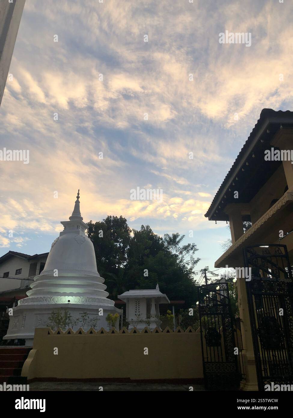 Sri Lankan Buddhist Temple with Peaceful Morning Sky - Smartphone Captured Stock Image