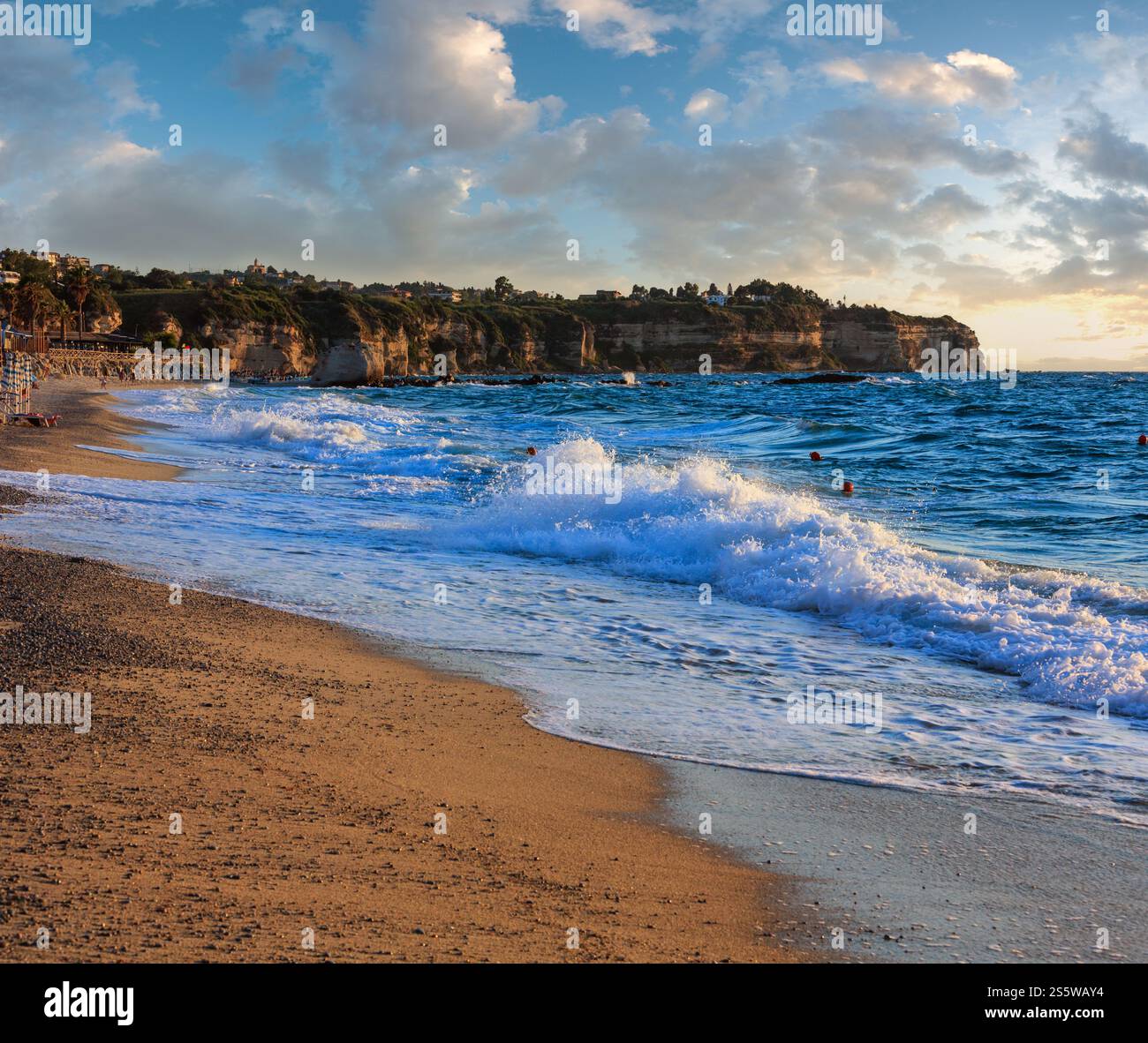 Tropea town beach evening view, Calabria, Italy, Tyrrhenian Sea. People unrecognizable. Stock Photo