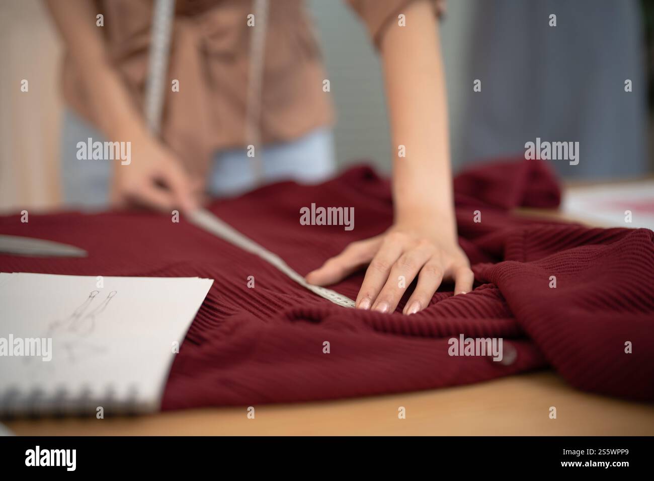 Start-up Stylish Fashion Designer work as sketch of new collection in atelier. Creative Design Concept Stock Photo