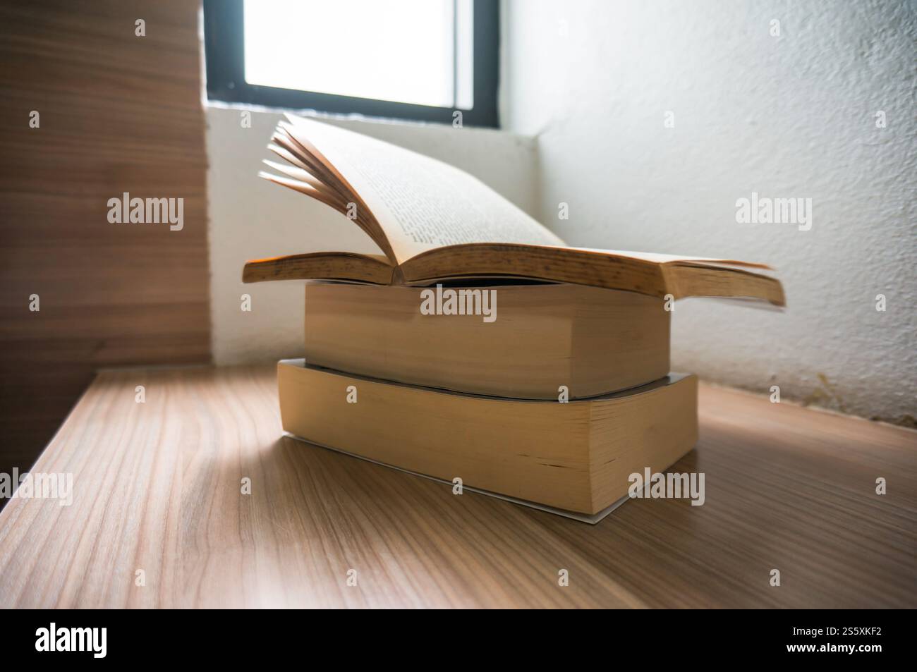 Open old books on the table in library Education learningbooks close up. Stock Photo