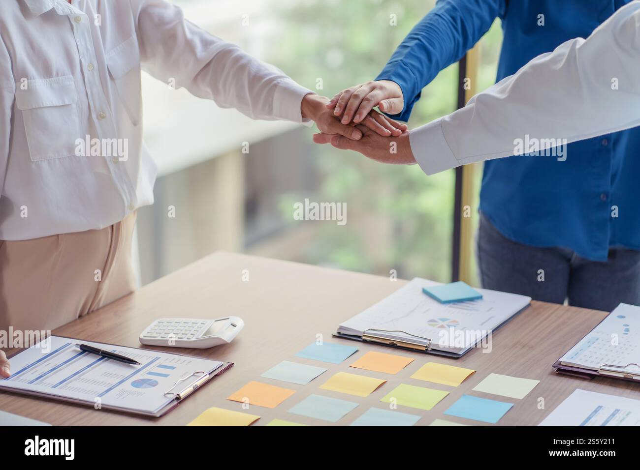 Business partnership putting hands together team start up project business people join hands partnership Unity and teamwork Stock Photo