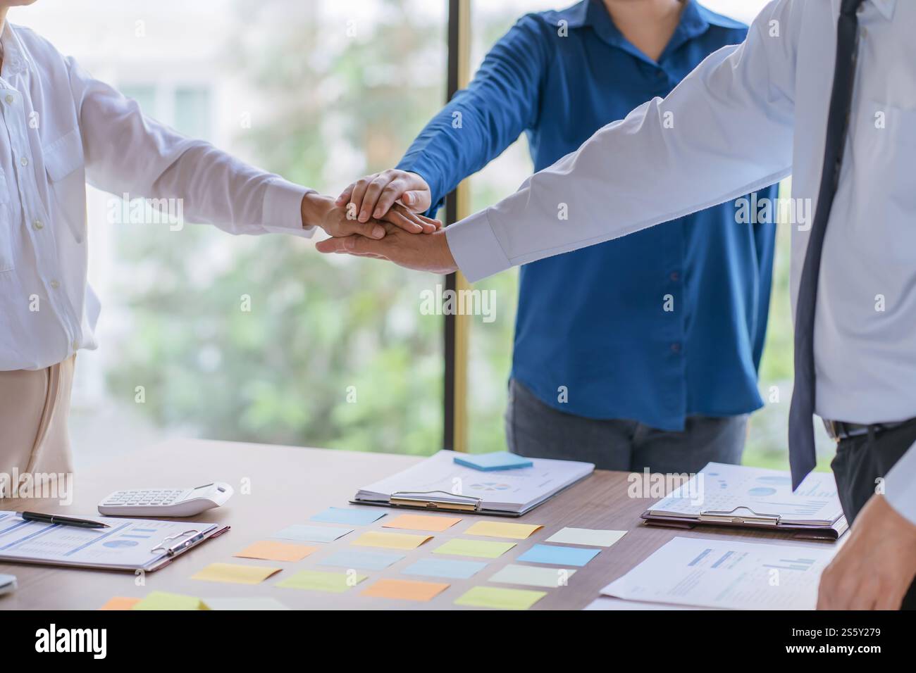 Business partnership putting hands together team start up project business people join hands partnership Unity and teamwork Stock Photo