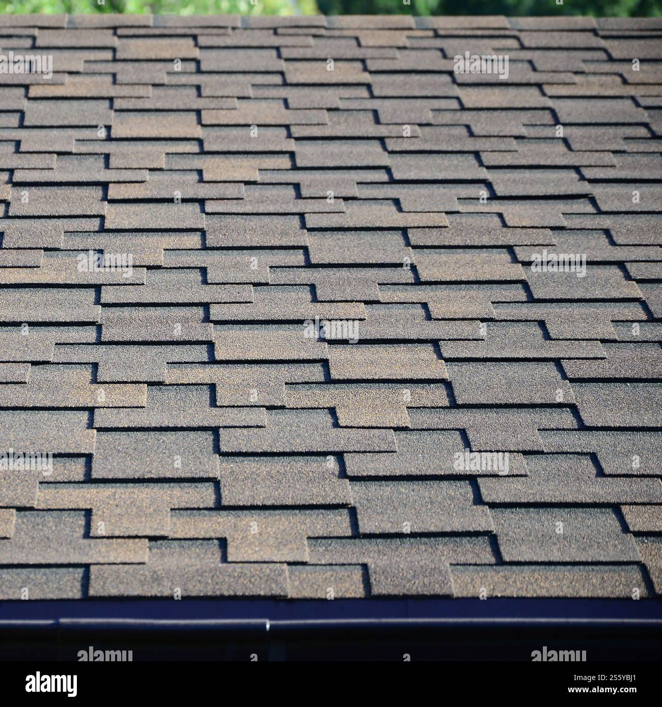 Modern roofing and decoration of chimneys. Flexible bitumen or slate ...