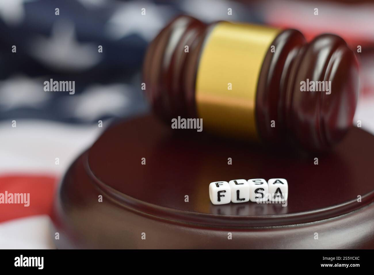 Justice mallet and FLSA acronym close up. Fair labor standarts act ...