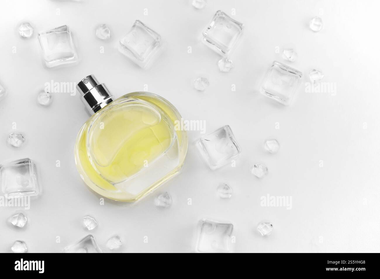 Female perfume yellow bottle, Objective photograph of perfume bottle in ...