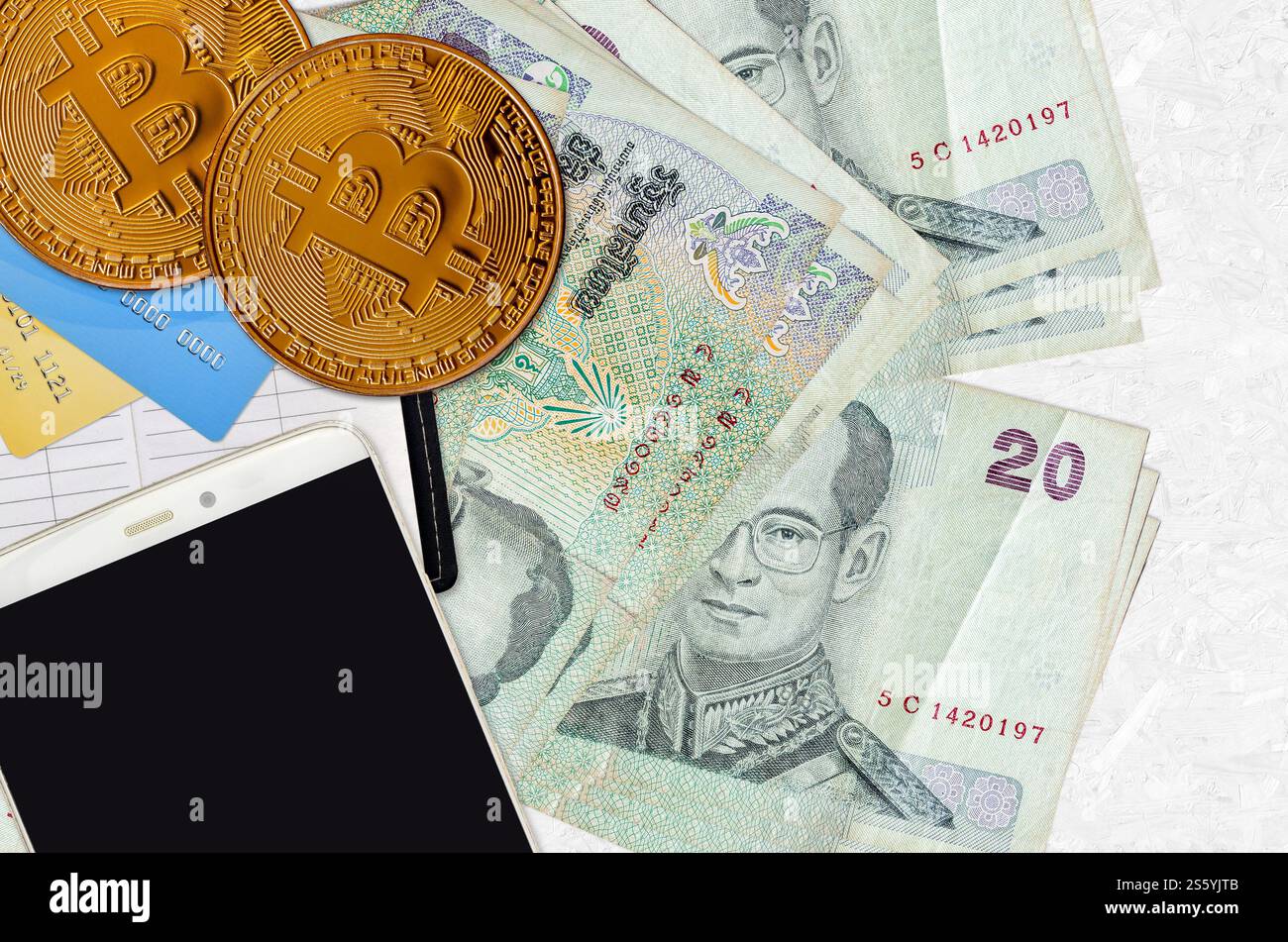 20 Thai Baht bills and golden bitcoins. Cryptocurrency investment concept.  Crypto mining or trading transactions Stock Photo - Alamy