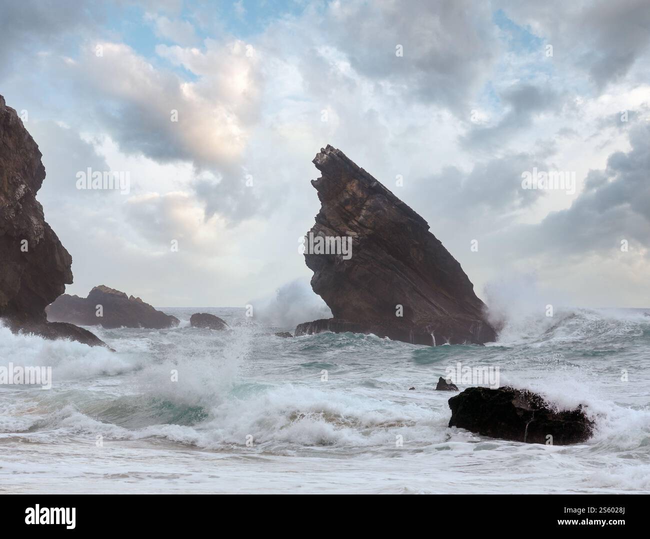 Atlantic ocean coast view (granite boulders and sea cliffs) in cloudy ...