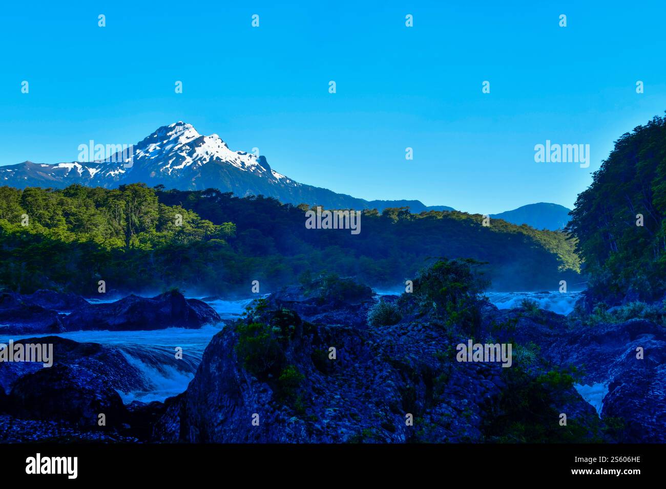 petrohue-cascades-with-snow-peaks-in-the-background-chile-stock-photo