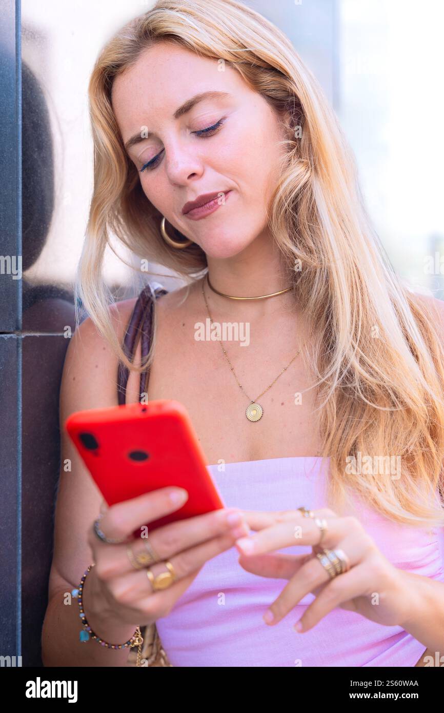 Modern woman using smartphone hi-res stock photography and images - Alamy