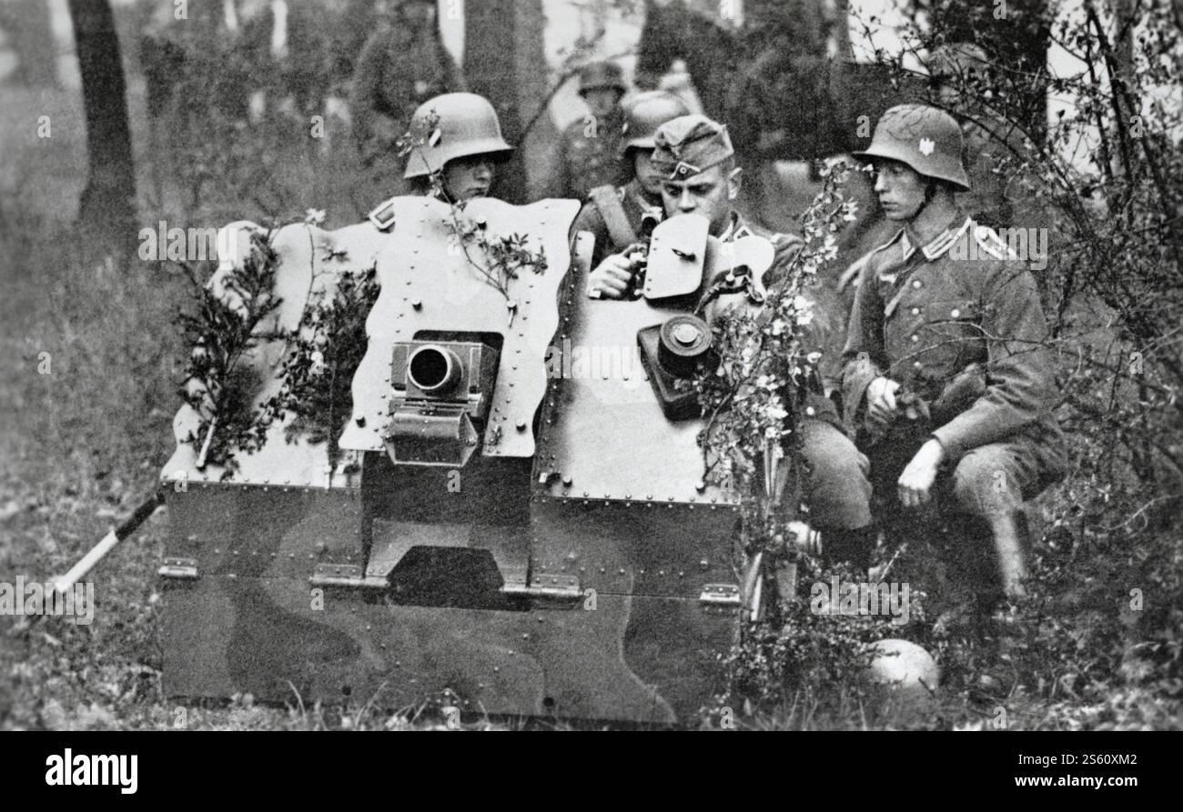 German soldiers maning a 7.5cm Infantry gun during the Second World War ...