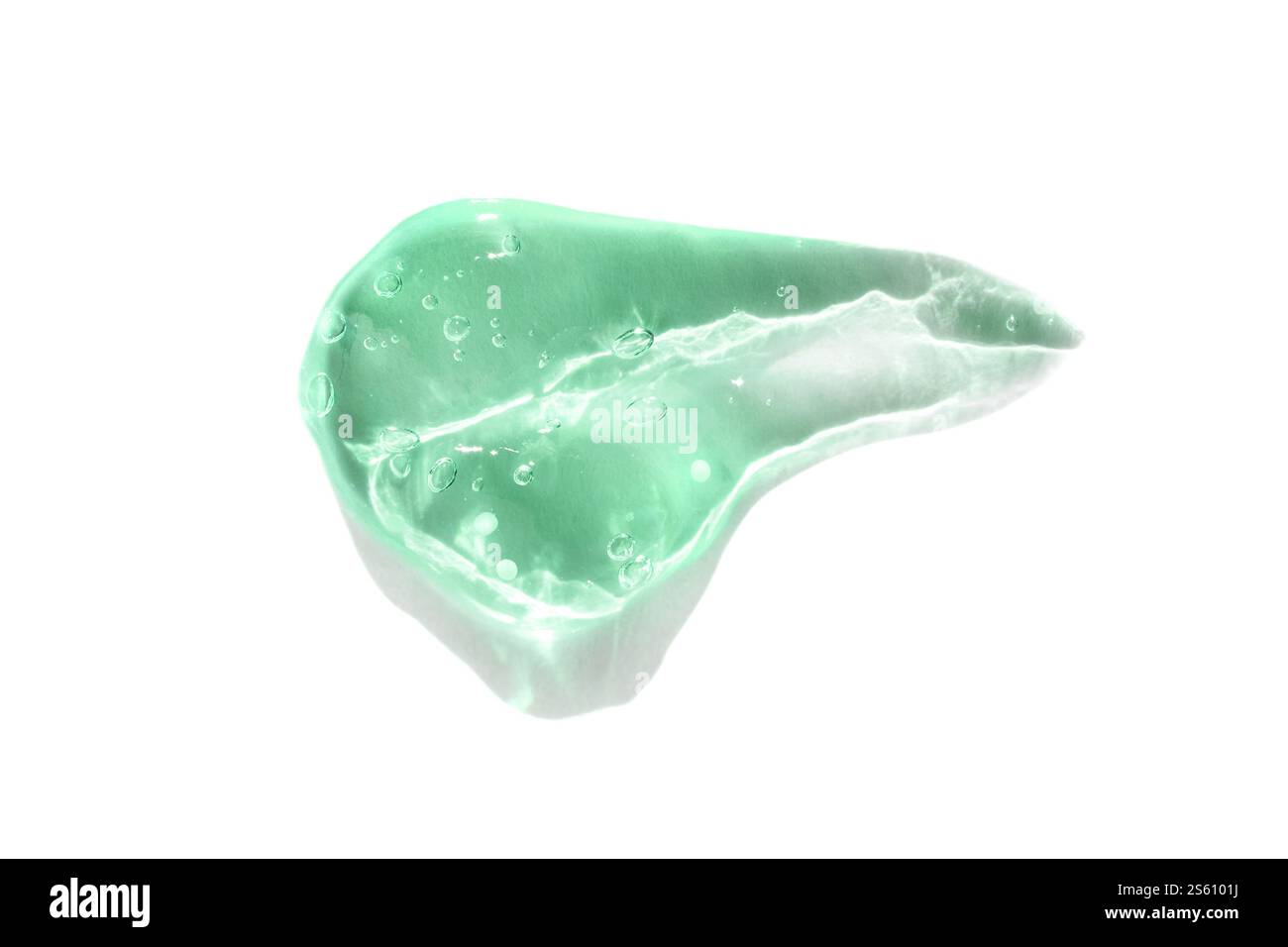 Green crystal soap with bubbles on white background. Stock Photo