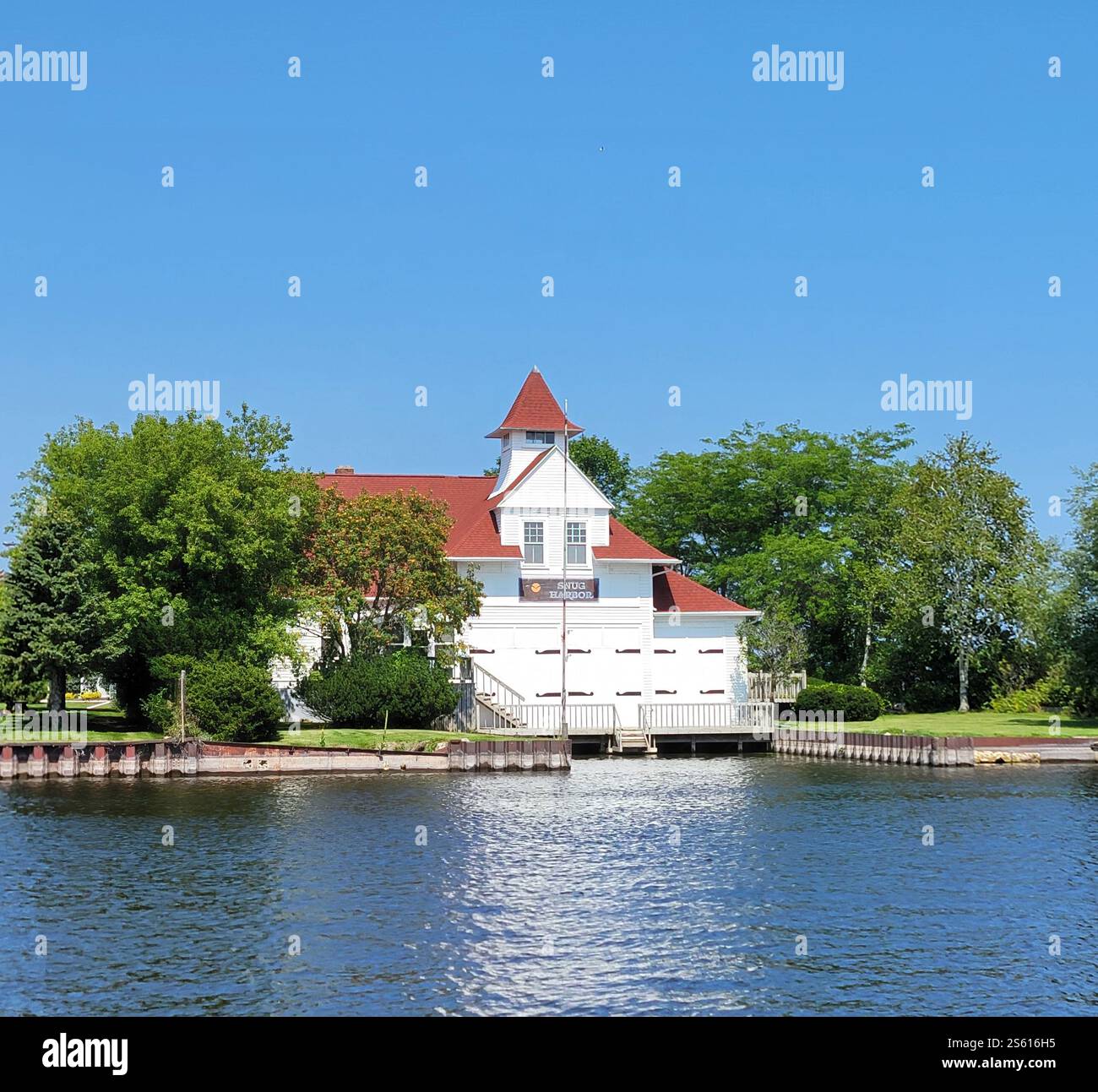 Kewaunee Lifesaving Station, Kewaunee, Wisconsin. The historic former Lifesaving Station and Coast Guard Depot is now a country Inn, Snug Harbor. - Smartphone Captured Stock Image
