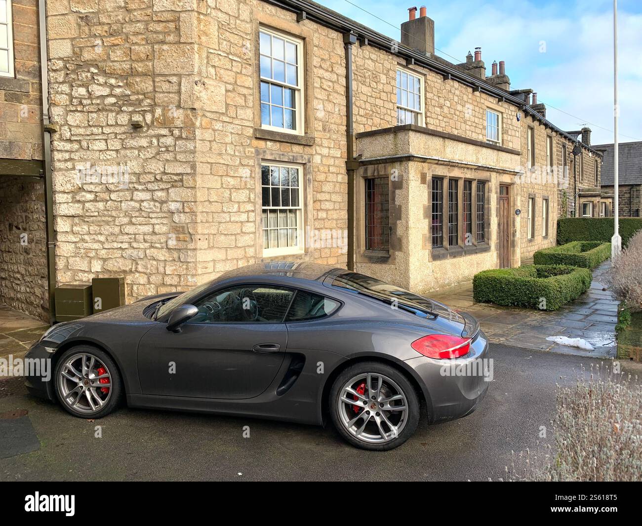 Burley in Wharfedale houses house West Yorkshire place live lived lives town Village Country England British UK stone type homes family Porche - Smartphone Captured Stock Image