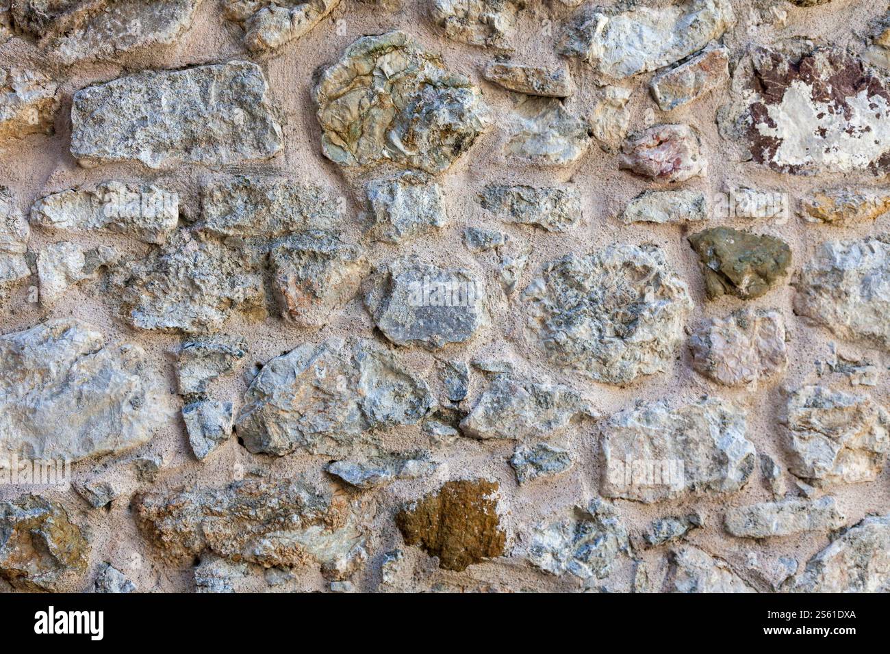 Stonewall. A stone wall made using concrete. Close up background. Stock Photo