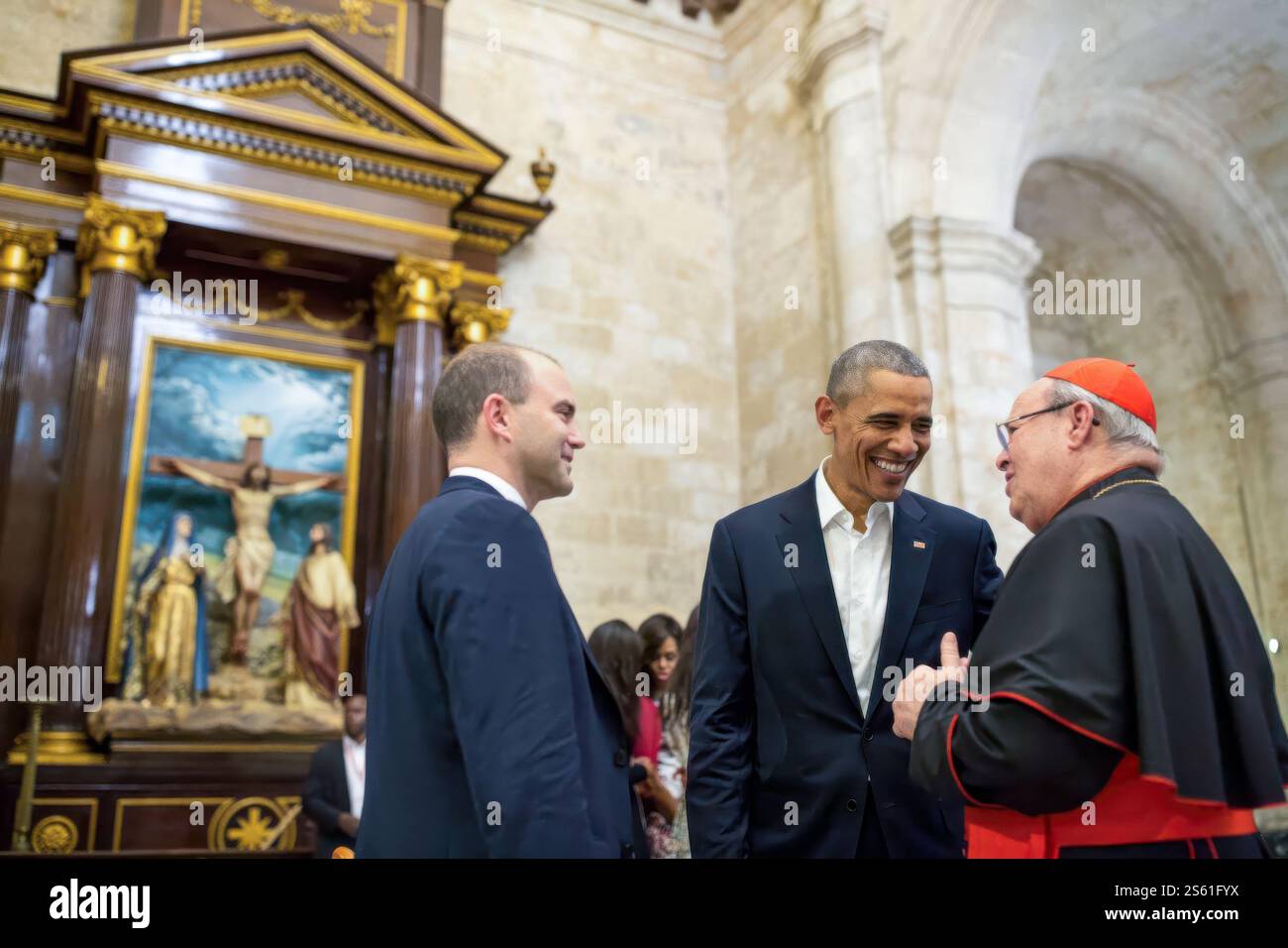 President Barack Obama and Ben Rhodes talk with Cardinal Jamie Ortega while touring La Catedral de la Virgen Maria de la Concepcion Inmaculada with Cardinal Jamie Ortega in Old Havana, Cuba, Sunday, March 20, 2016.   (Official White House Photo). IMAGE WITH RESTRICTIONS, see the Additional Info field Stock Photo