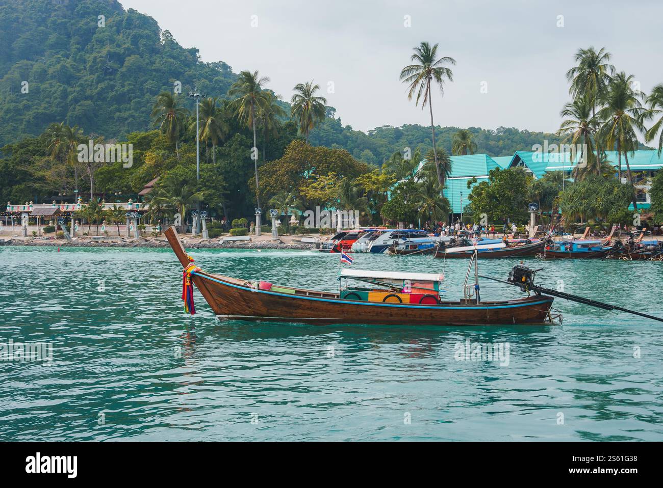 Traditional Thai Longtail Boat on Turquoise Waters in Koh Phi Phi Stock Photo